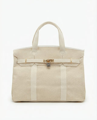 new boatkin bag with under stated natural color with a gold lock