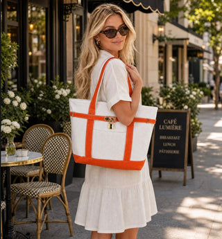 Boatkin zip-top canvas boat tote styled at an outdoor cafe