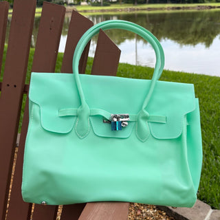 Green Jelly Firkin bag — glossy PVC jelly birkin-style tote with top handles and front turn-lock