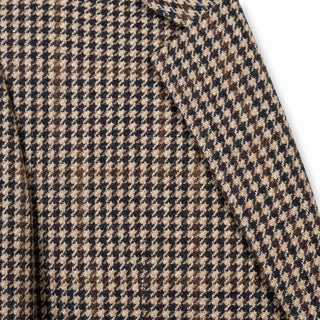 Coppley houndstooth sport coat fabric close-up showing tan, navy and brown weave