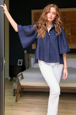 Woman in Collin Cape Navy Linen Shirt