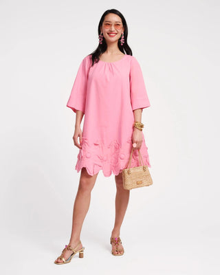 Pink zinnia dress with floral hem and handbag