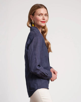 Woman wearing navy linen shirt