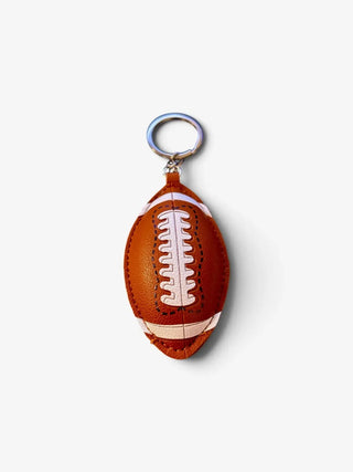Football keychain and bag charm in white and brown vegan leather, front view