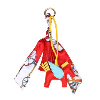 bag charm with red pegasus, twilly and tassel