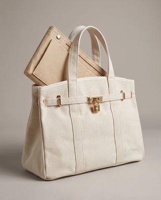 a beige boatkin bag with an organizer inserted in the top