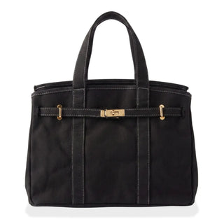 A black canvas boatkin tote bag with white contrast stitching, featuring a front horizontal strap closure with gold-tone hardware and dual top handles, shown on a white background. 