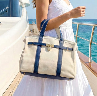 boatkin bag structured canvas tote with gold turn-lock closure, navy trim