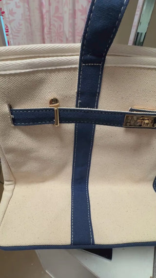 Boatkin Bag gold turn-lock hardware detail — canvas tote close-up