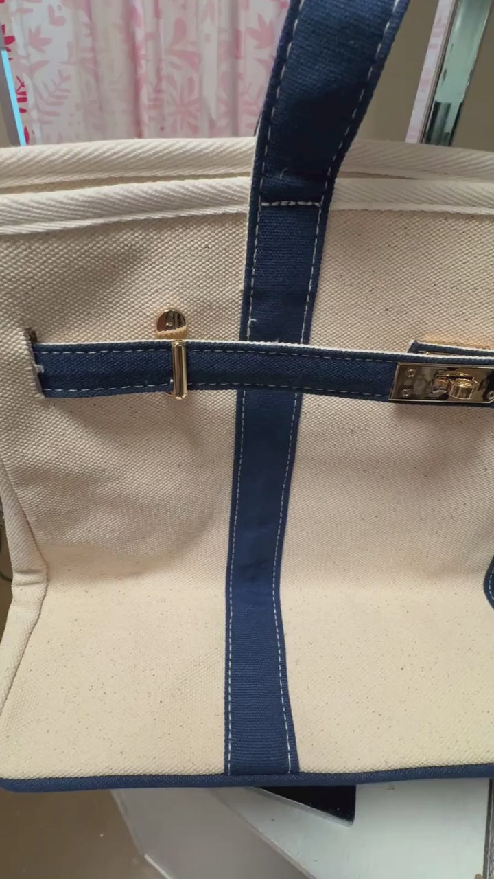 Boatkin Bag gold turn-lock hardware detail — canvas tote close-up
